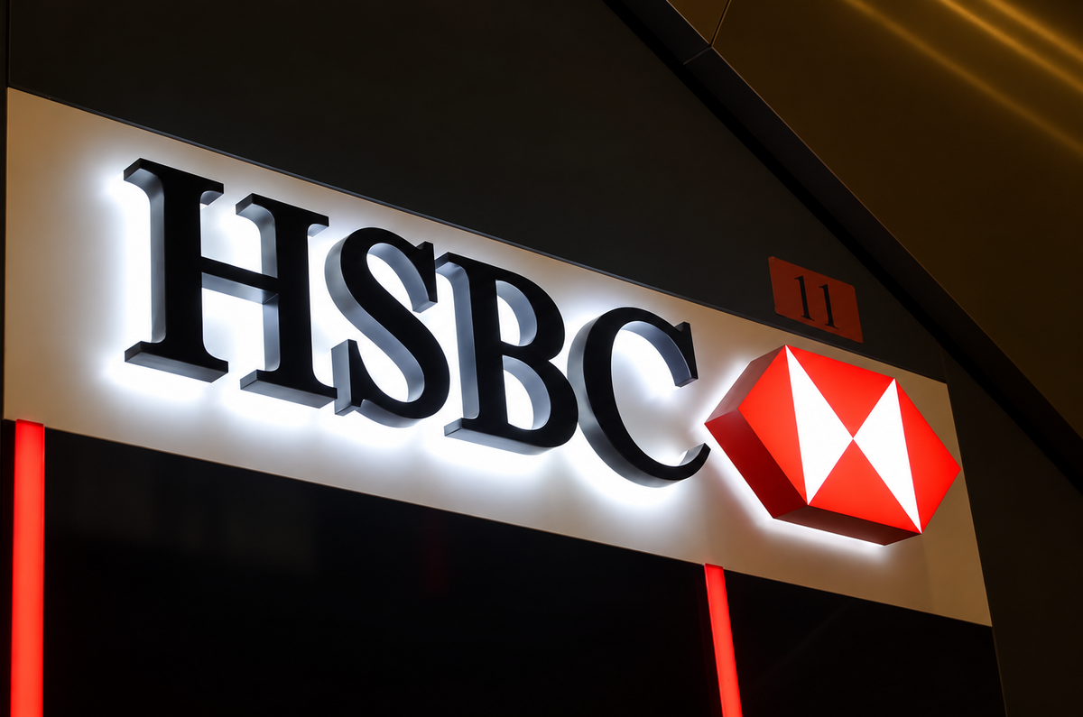 Halo-lit business name mounted above a contemporary UK storefront