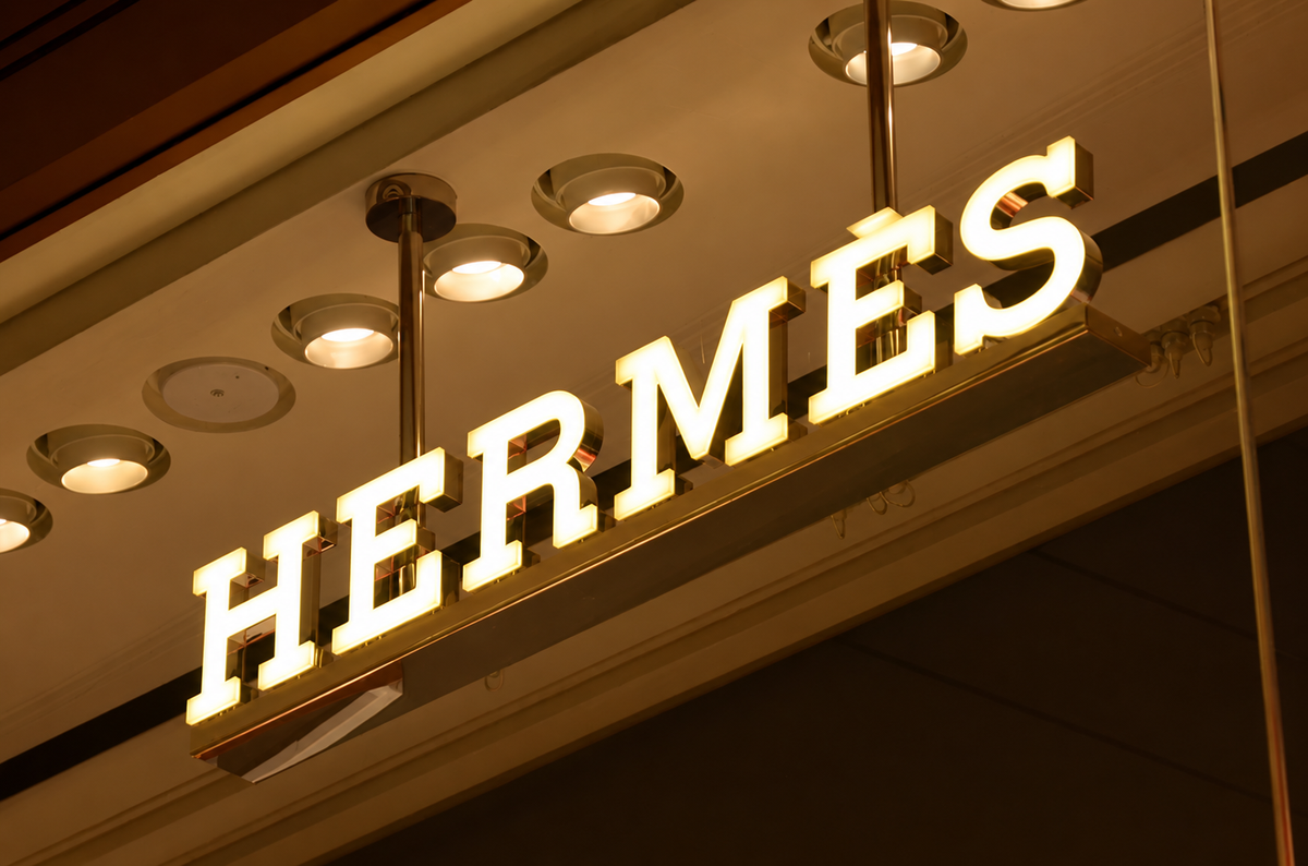 Illuminated front-lit letters installed across a modern retail storefront