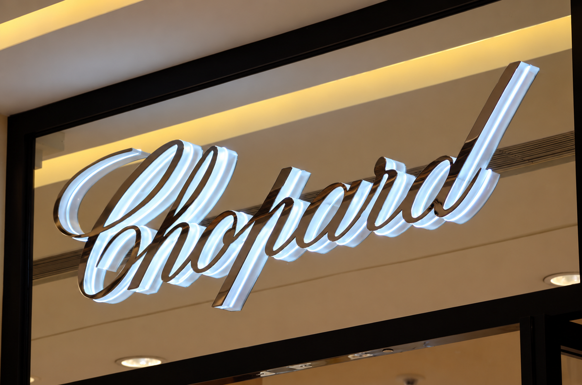 Side-lit dimensional letters viewed from an angle on a commercial wall