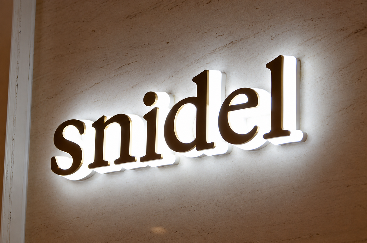 Close-up of evenly illuminated blue edges around dimensional letters
