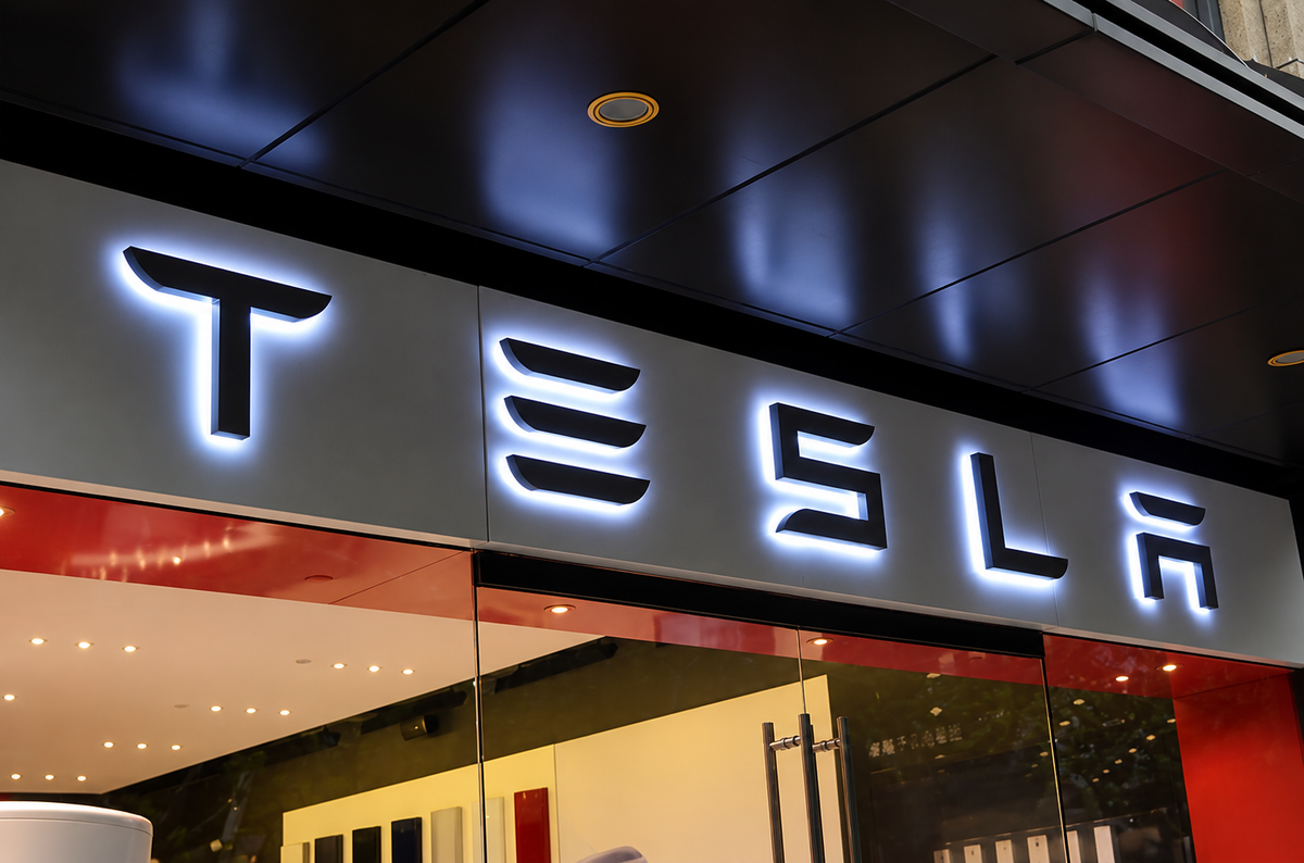 Custom halo-lit business letters glowing against an exterior wall